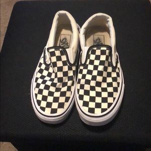 Checkered vans.
